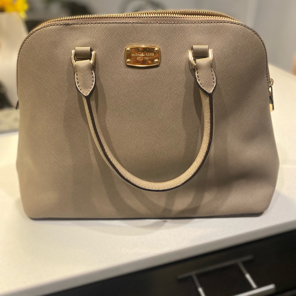 Michael Kors top-handle bags-in excellent condition. Used for a short time only!
